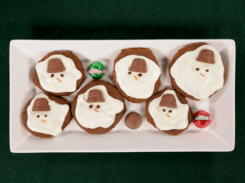 6 Snowmen Melt-Away Cookies on a rectangular plate